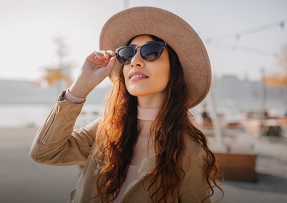 A woman wearing sunglasses on a day